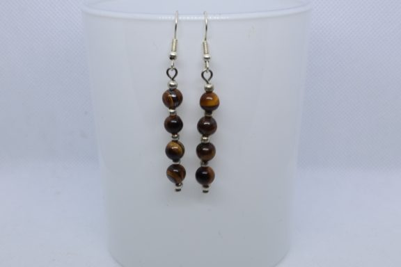 4 Bruin gevlekte kralen 6MM met zilverkleurige kraaltjes ertussen aan een oor haakje